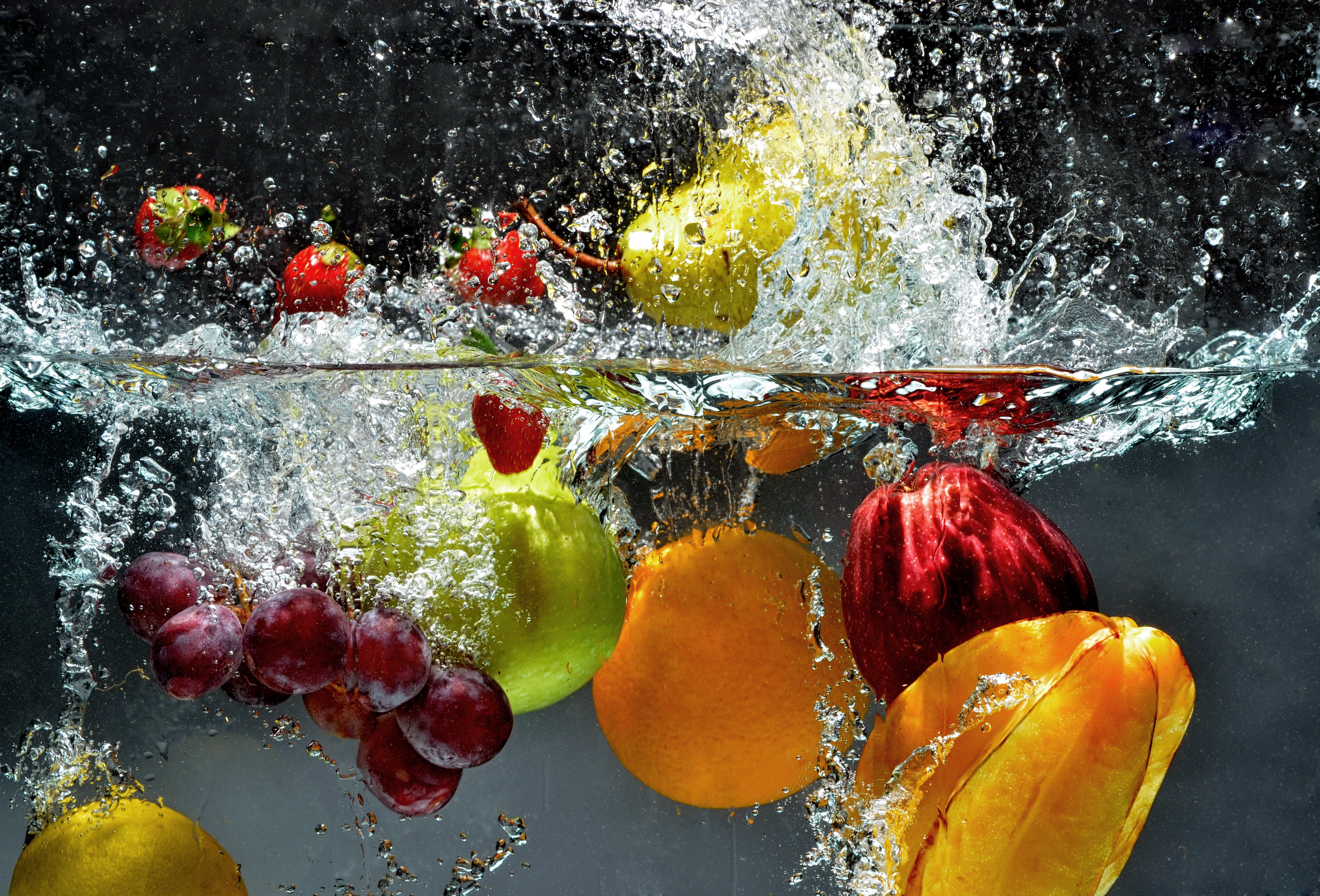 Splashing fruit on water